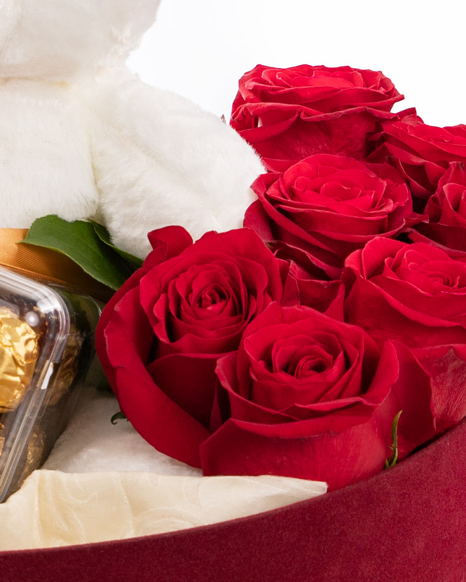 Red roses in heart box