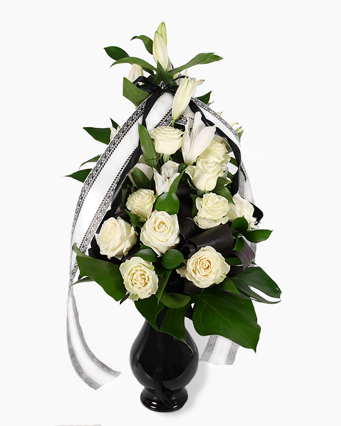 Funeral bouquet with roses and lilies