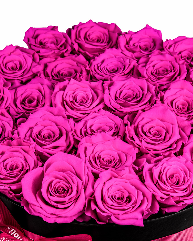 Pink preserved roses in black box