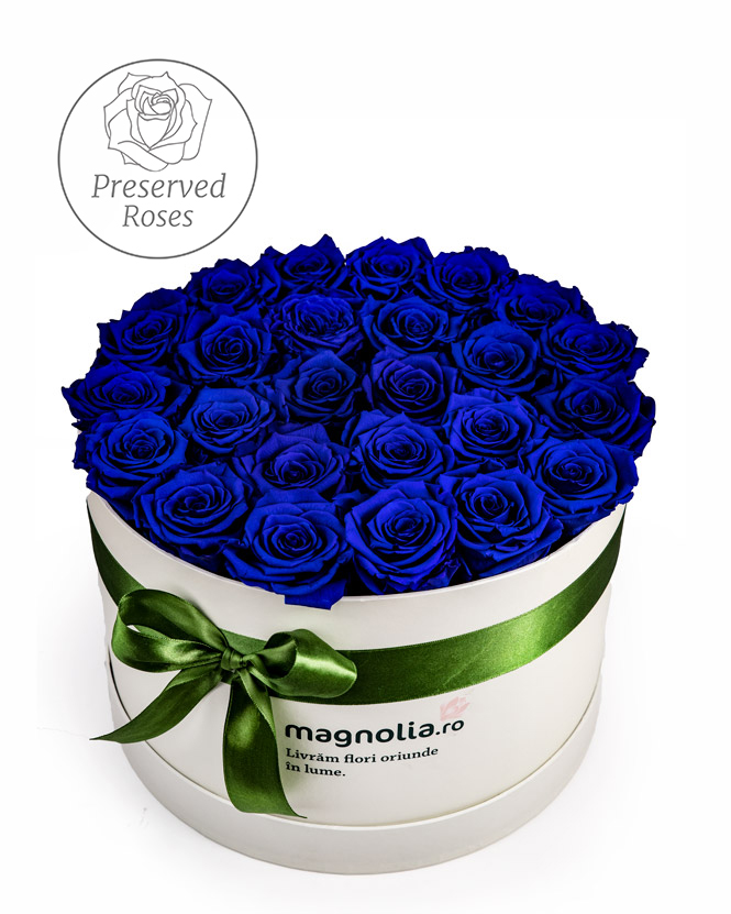 Box with blue preserved roses