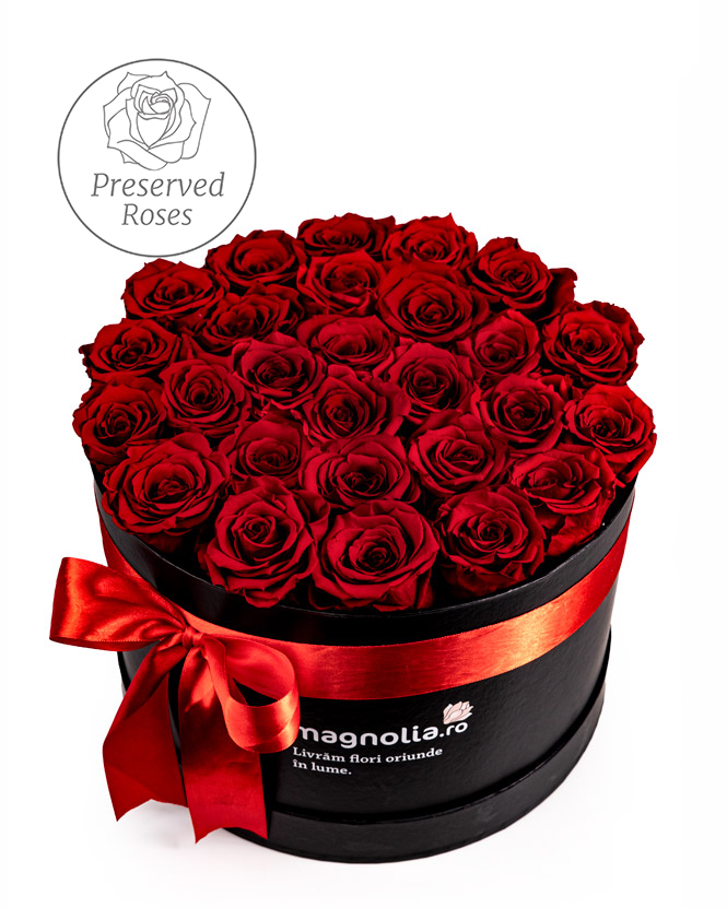 Preserved red roses in a black box