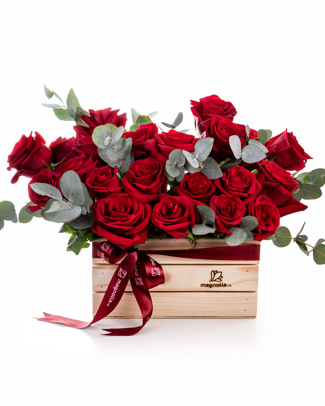 Wooden box with red roses