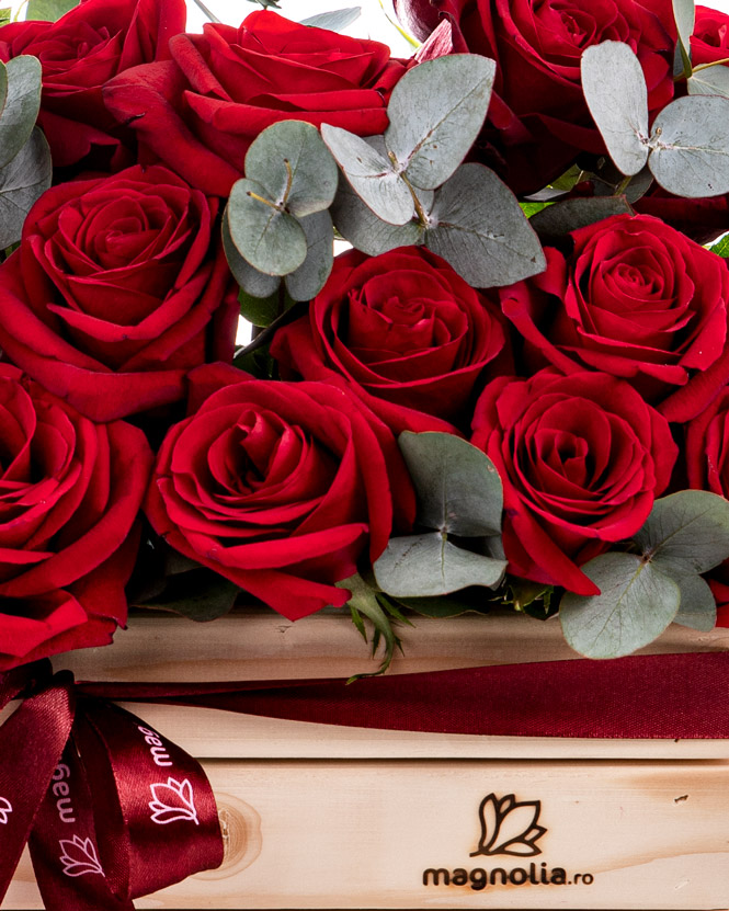Wooden box with red roses