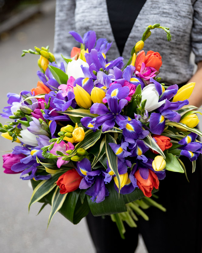 Bouquet with tulips, irises and freesias