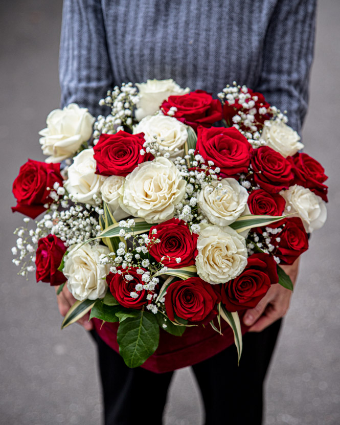 White and red roses in heart shaped box