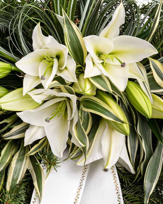 Funeral wreath with white lilies