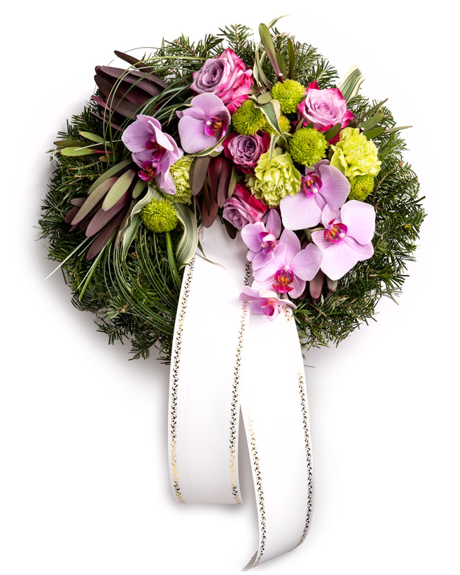 Funeral wreath with roses and orchids