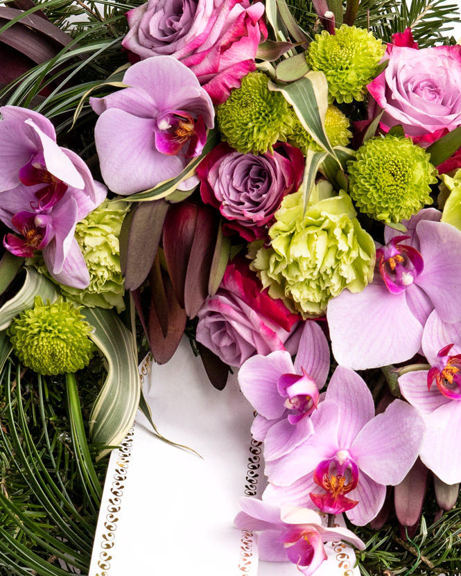 Funeral wreath with roses and orchids