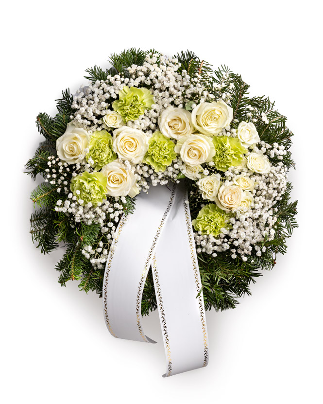 Funeral wreath with white roses and carnations