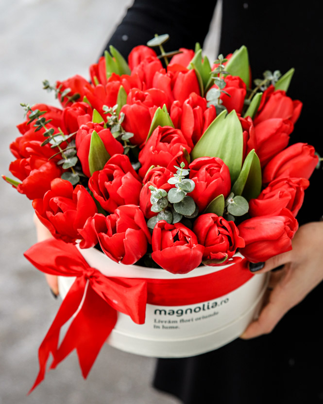 Box with red tulips