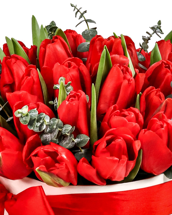 Box with red tulips