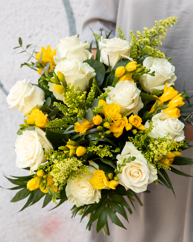 White roses and freesia bouquet