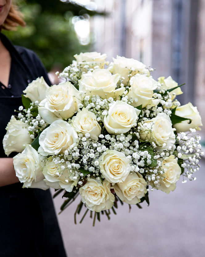 Bouquet of white roses and gypsophila
