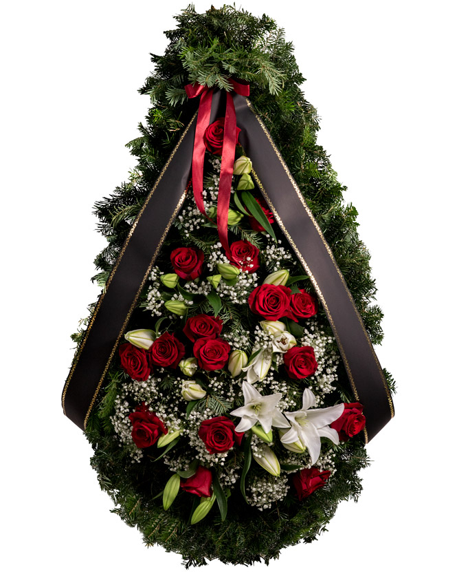 Funeral wreath with roses and lilies