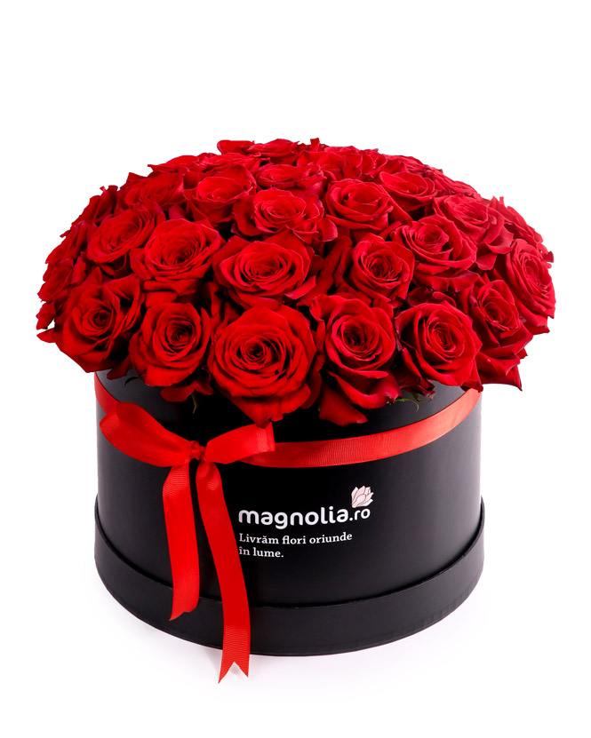 Arrangement in box with red roses