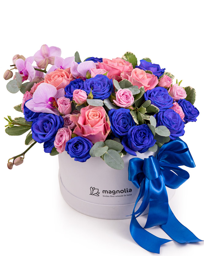 Arrangement with blue roses and orchids