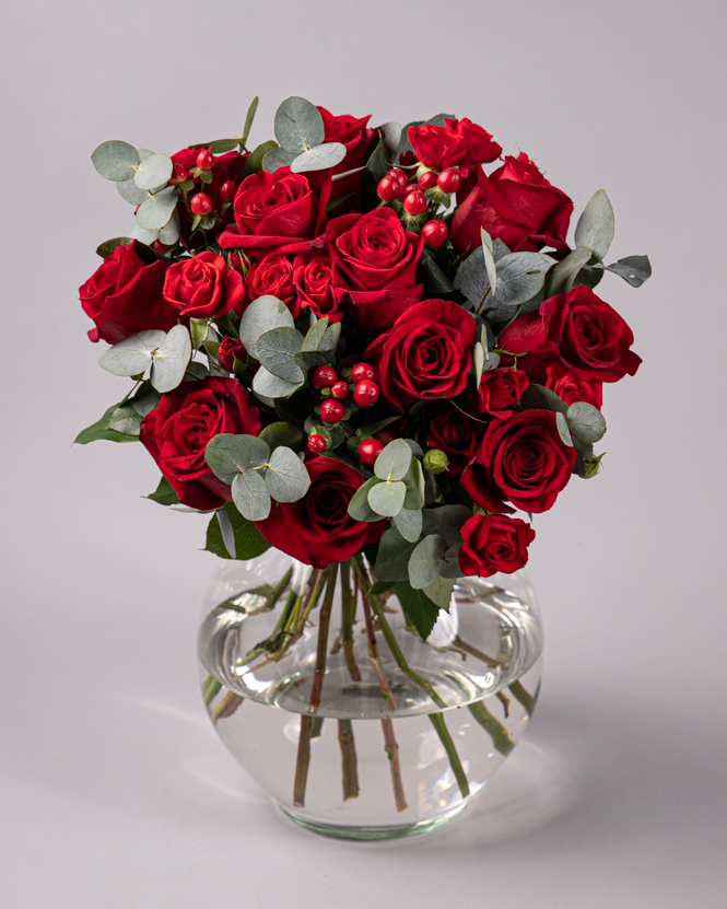 Bouquet with red roses and greenery