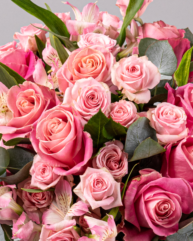Bouquet with pink roses and greenery