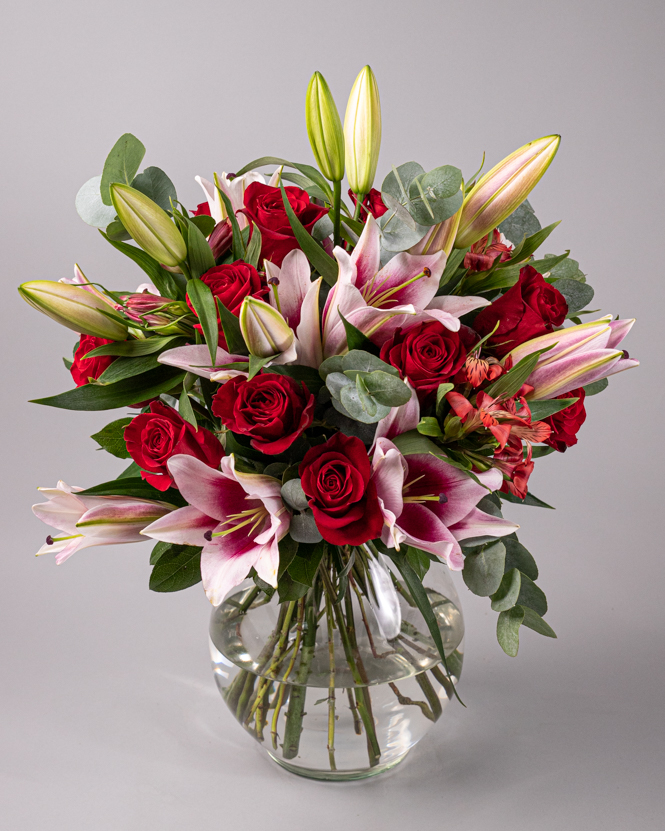 Bouquet of red roses and lilies