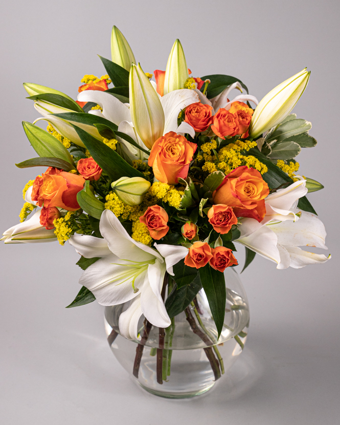 Bouquet of orange roses and lilies