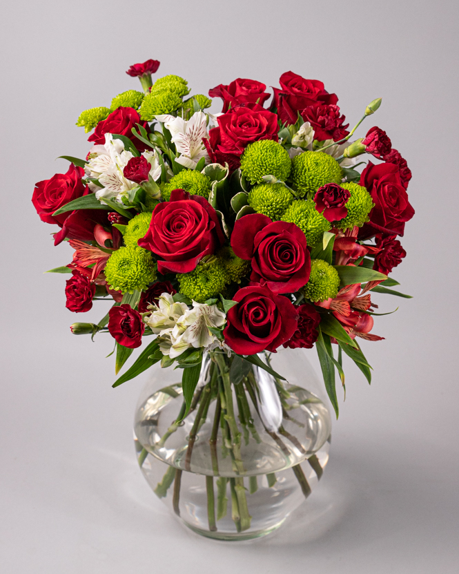 Bouquet of red roses and carnations