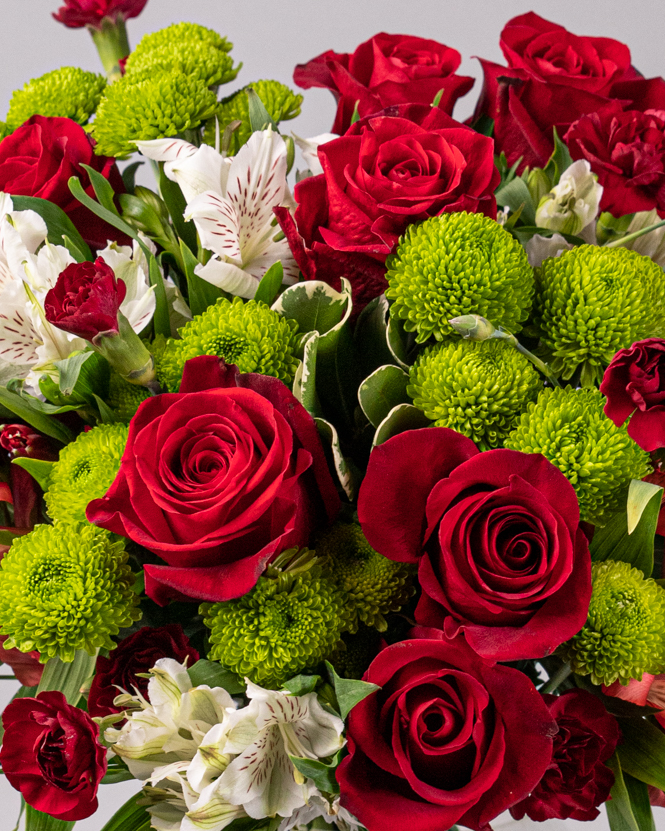 Bouquet of red roses and carnations