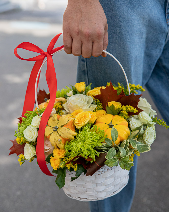 Roses, solidago and ornamental pumpkins autumn basket