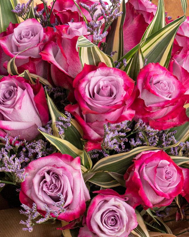 Purple roses and limonium bouquet