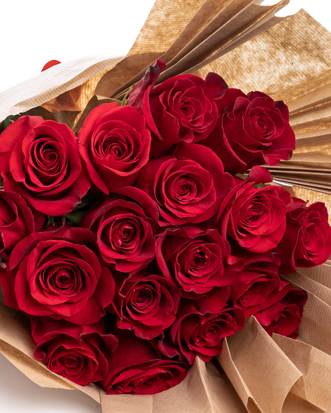 Romantic red roses bouquet and chocolate