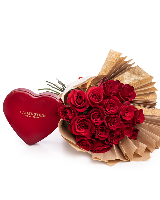 Romantic red roses bouquet and chocolate