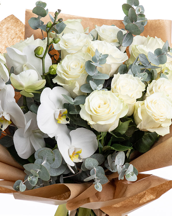 White roses and orchids bouquet