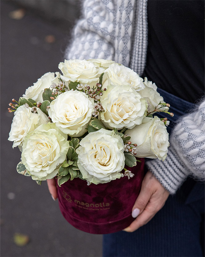 White roses arrangement in velvet box