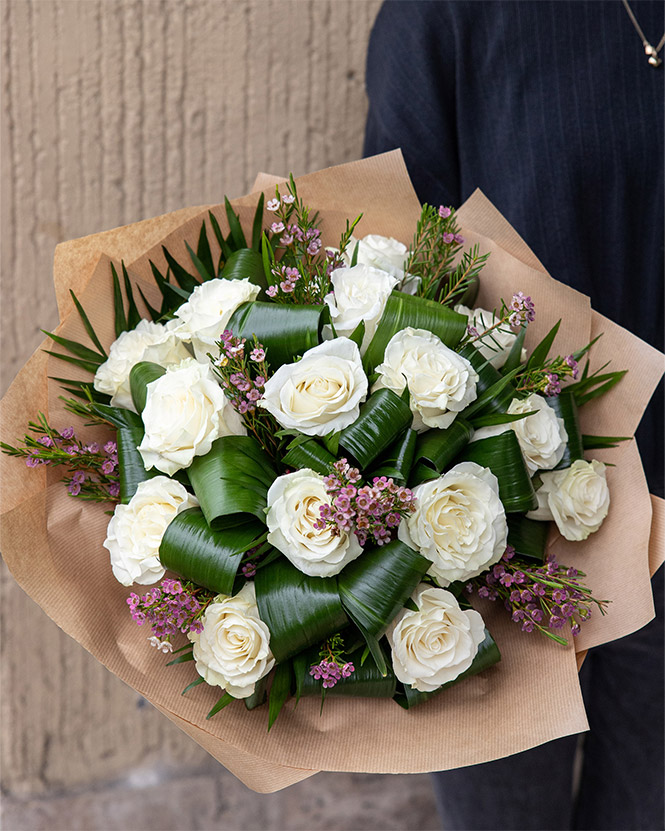 White roses bouquet with chamelaucium