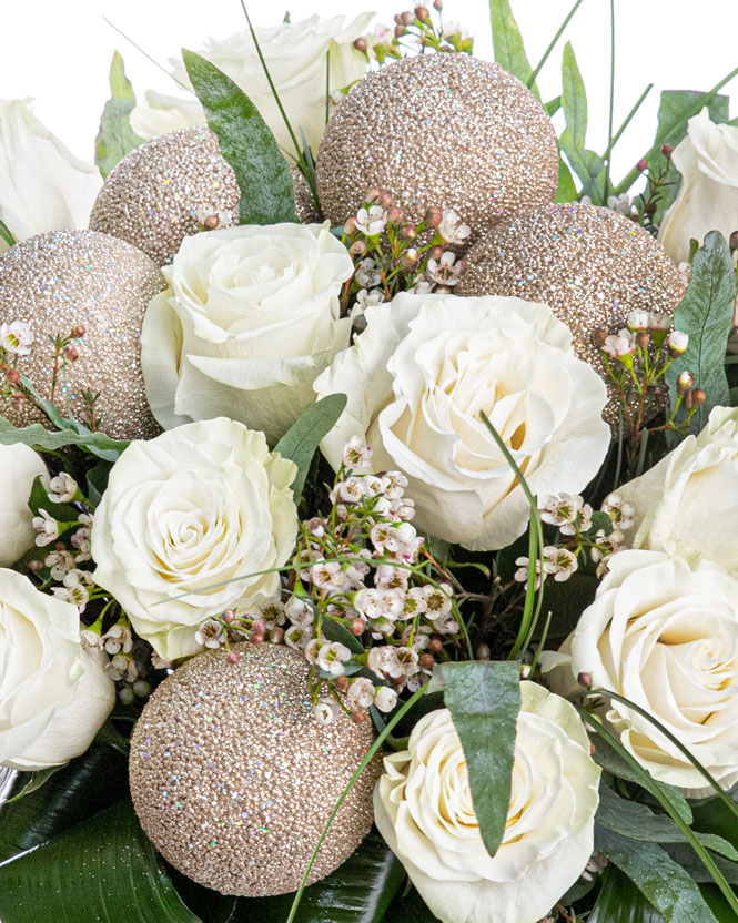 White roses bouquet with Christmas ornaments