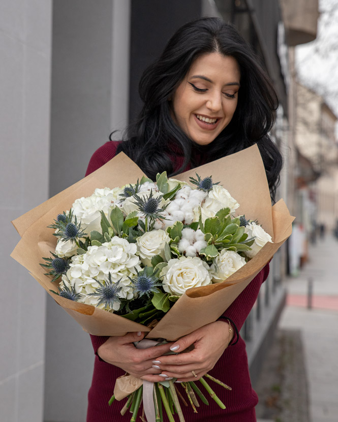 White roses bouquet with cotton