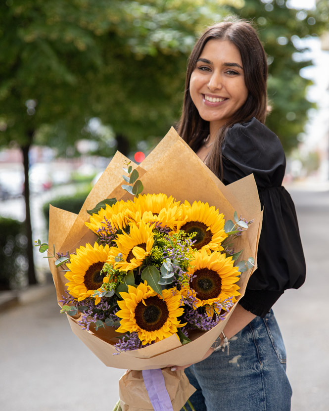 Bouquet with sunflower and solidago