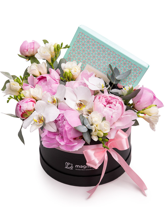 Arrangement with peonies, orchids and chocolate