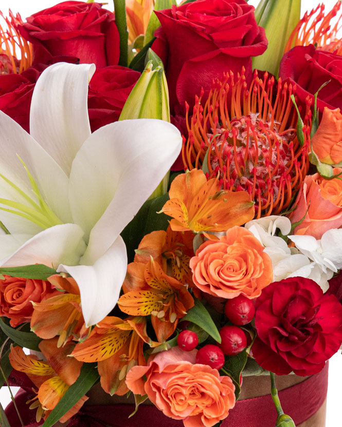 Arrangement with lilies and roses