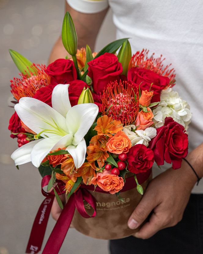 Arrangement with lilies and roses