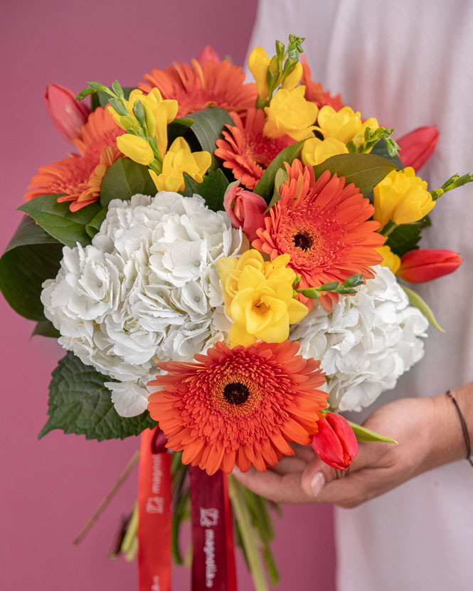 Bouquet of fresias tulips and gerberas