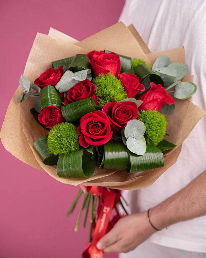 Bouquet with red roses and eucalyptus