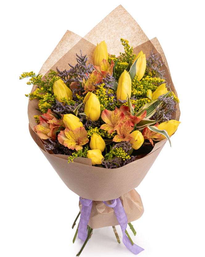 Cheerful bouquet with yellow tulips