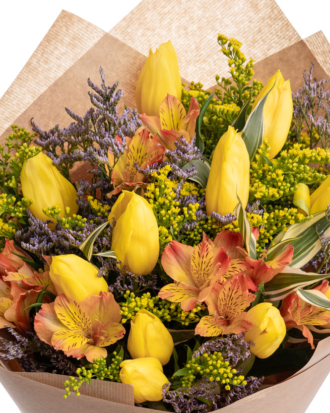 Cheerful bouquet with yellow tulips