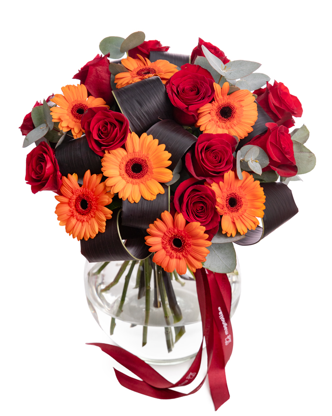 Bouquet with red roses and orange gerberas