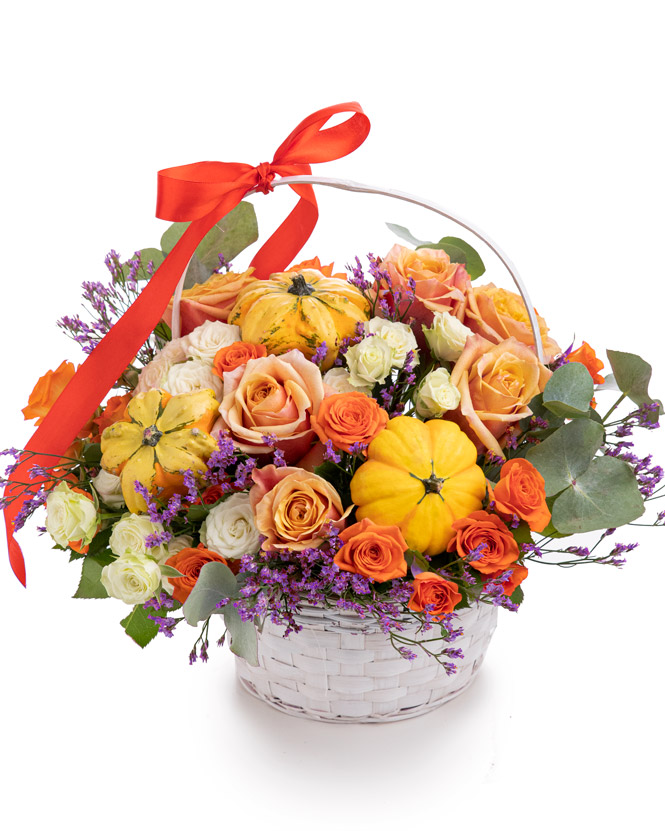 Roses and ornamental pumpkins autumn basket