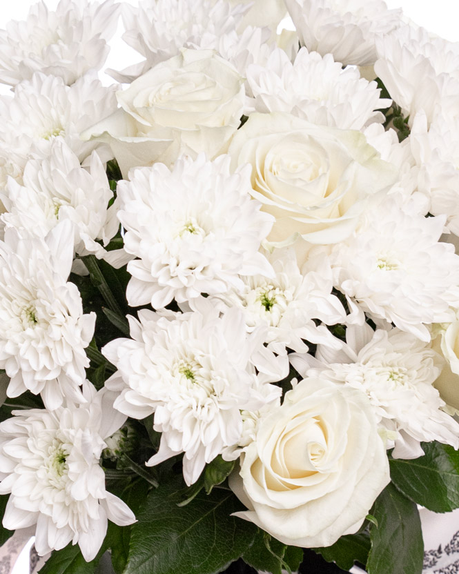 Funeral bouquet with white roses and chrysanthemums