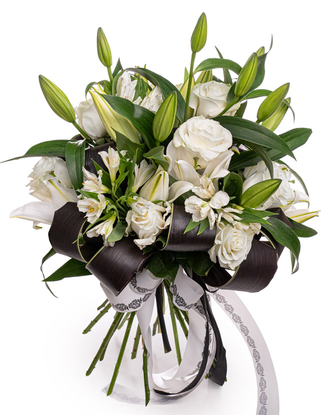 Funeral bouquet with roses and lilies