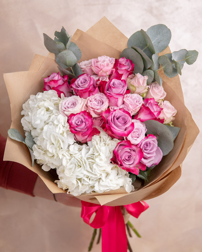 Bouquet with purple roses and hydrangea