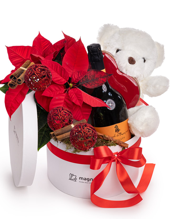 Christmas gift with flowers, chocolates and teddy bear