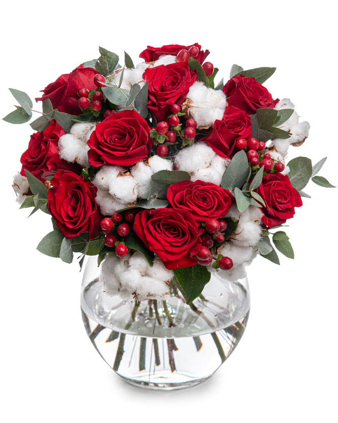 Bouquet of red roses and hypericum